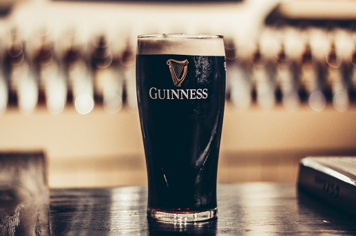 Greetings Card Design Four - A pint of Guinness on a bar with a blurred background